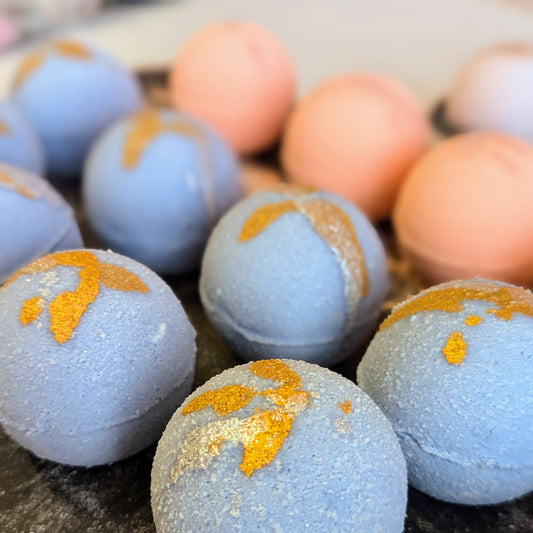 an open box of the bath bomb gift box.