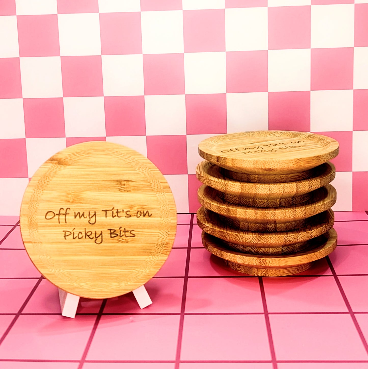 Charcuterie Wine Topper made from wood. Design says "off my tits on picky bits"