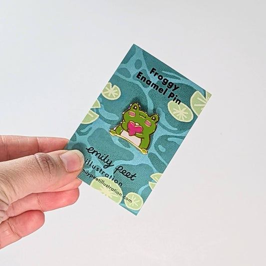 Frog and heart enamel pin by Emily Peet Illustration.