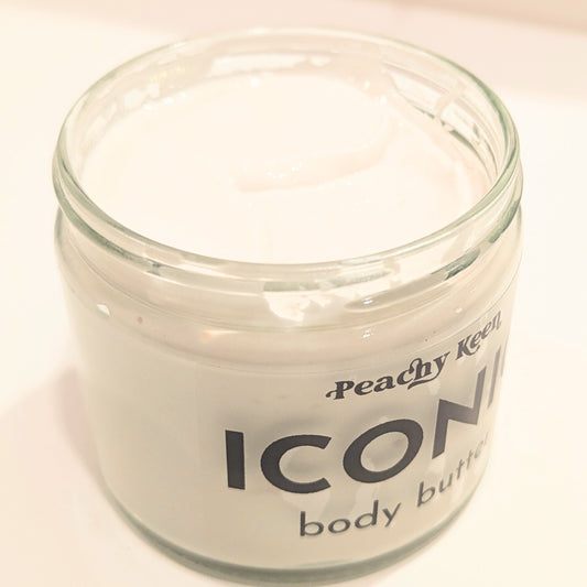 Glass jar of Peachy Keen Icon body butter on a white background
