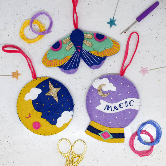The magical felt stitching kit makes 3 different hangings.