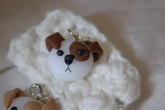 A sad dog charm made by Creative Clogs