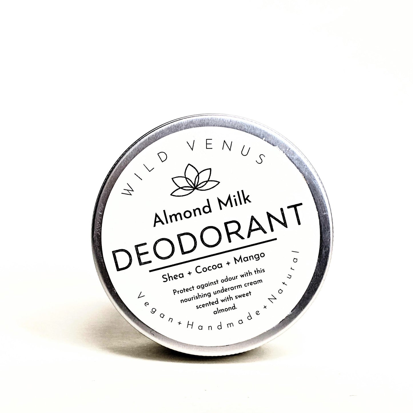 A tin of Almond Milk Deodorant against a white background. 