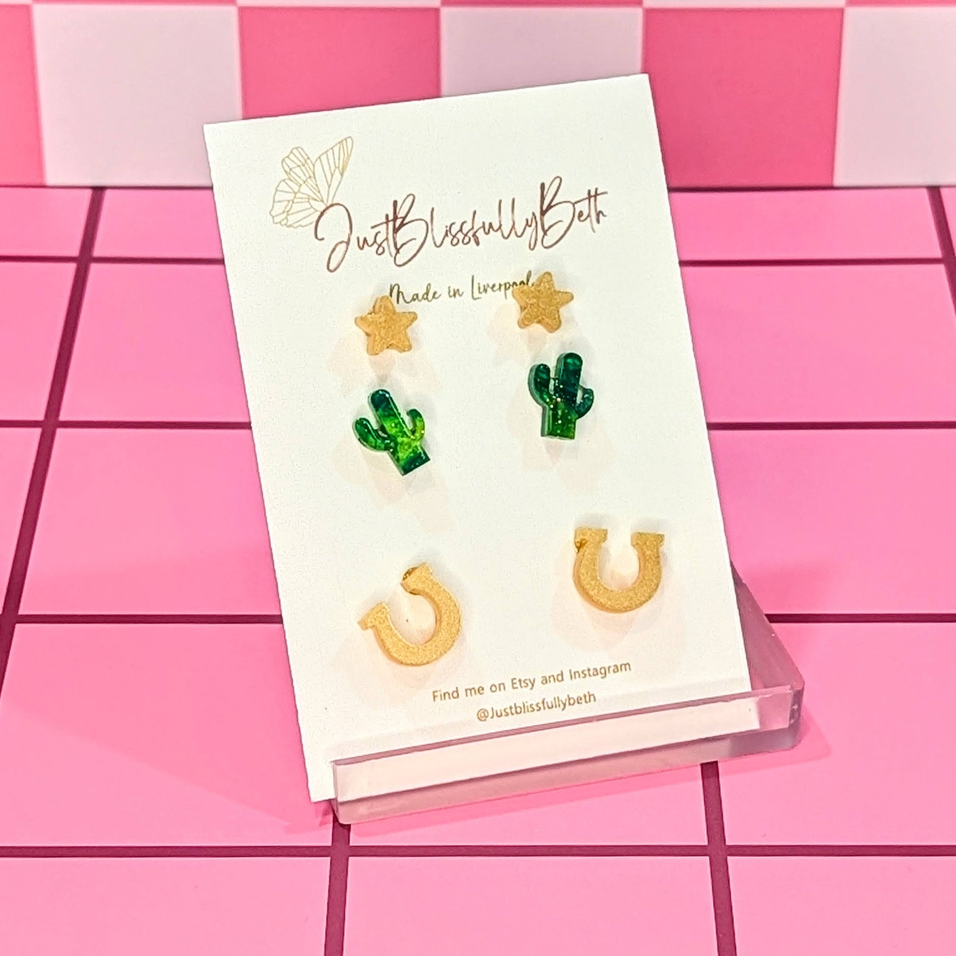 Cowgirl Stud Pack of Earrings with horseshoes, cactus and stars.