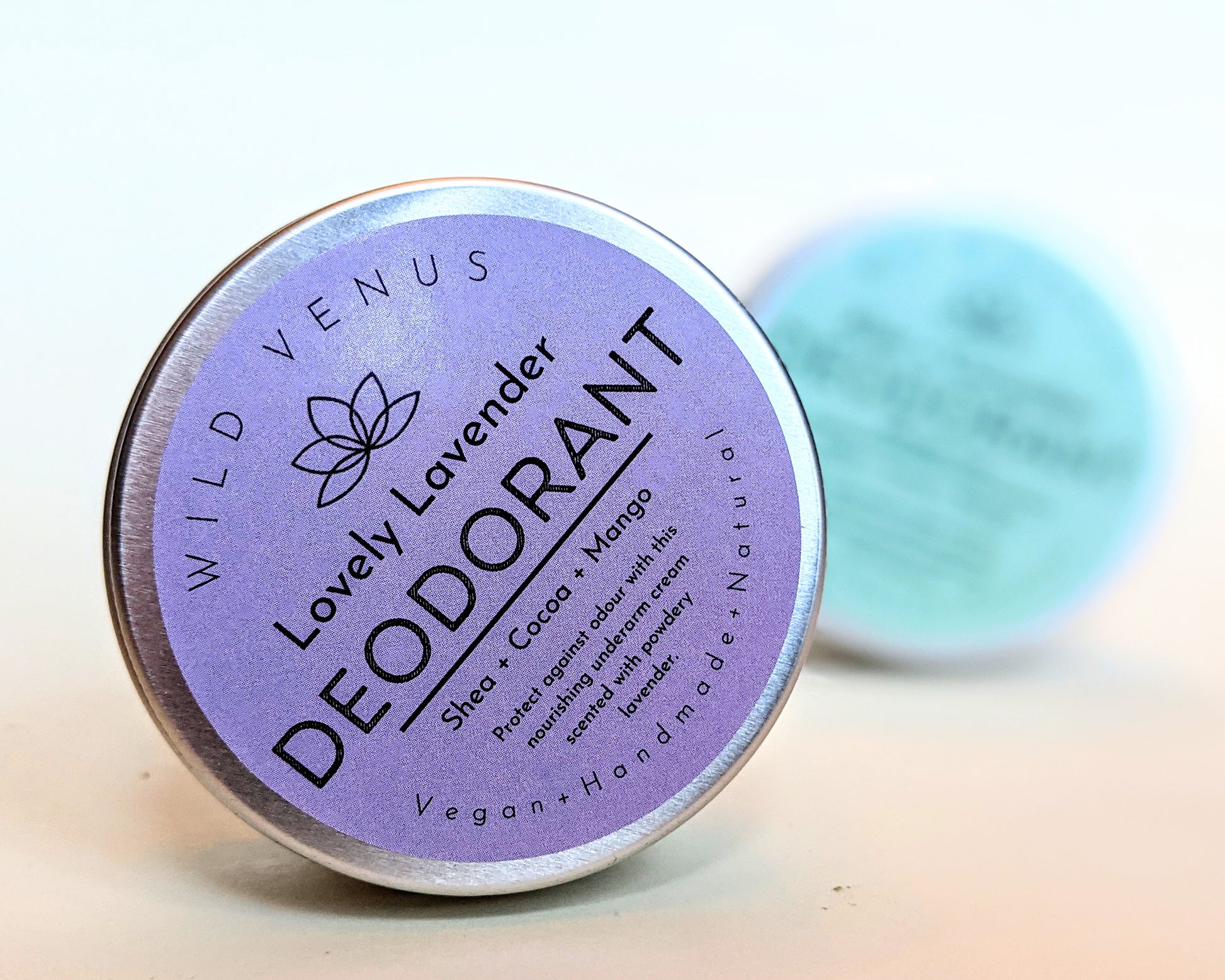 Lovely Lavender Deodorant in front of the aloe and cucumber deodorant. 