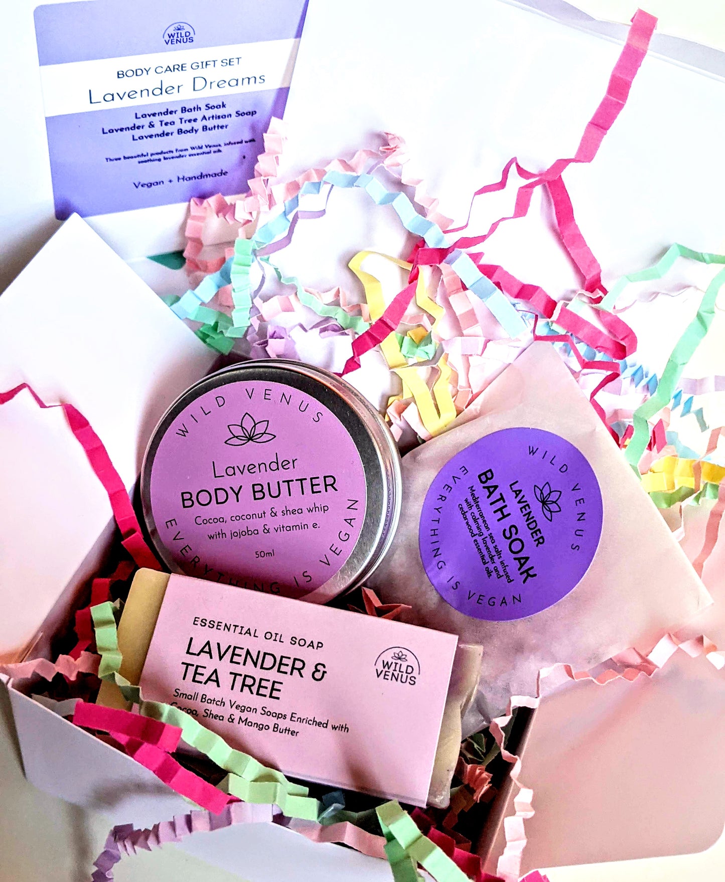 An open box of the lavender scented whipped body butter gift set. 