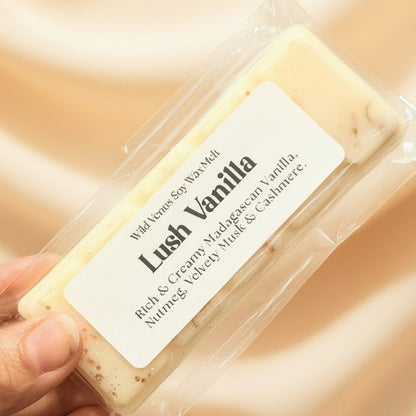 Lush vanilla wax melt against a creamy fabric background
