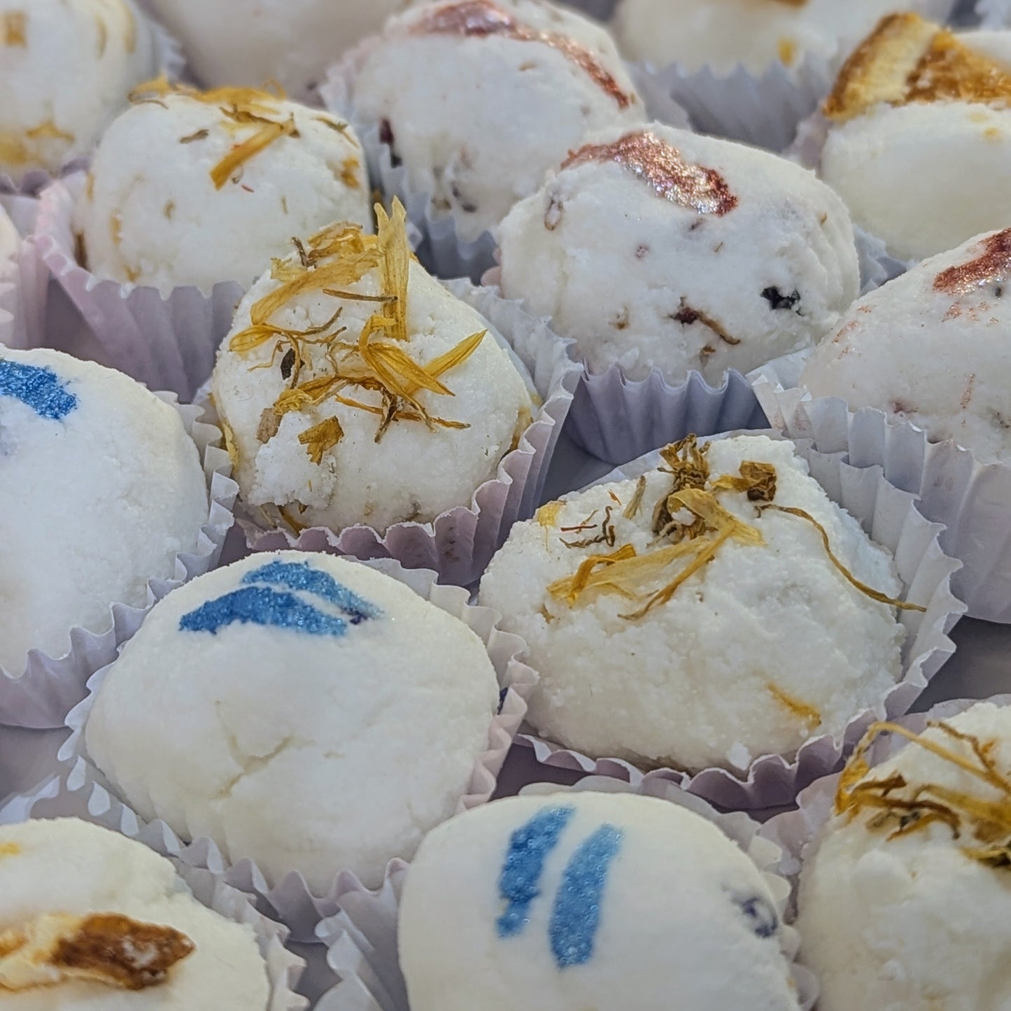 A photo of mango butter bath bombs.