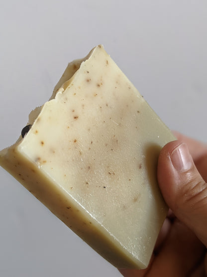 I am holding a bar of the herb garden soap.