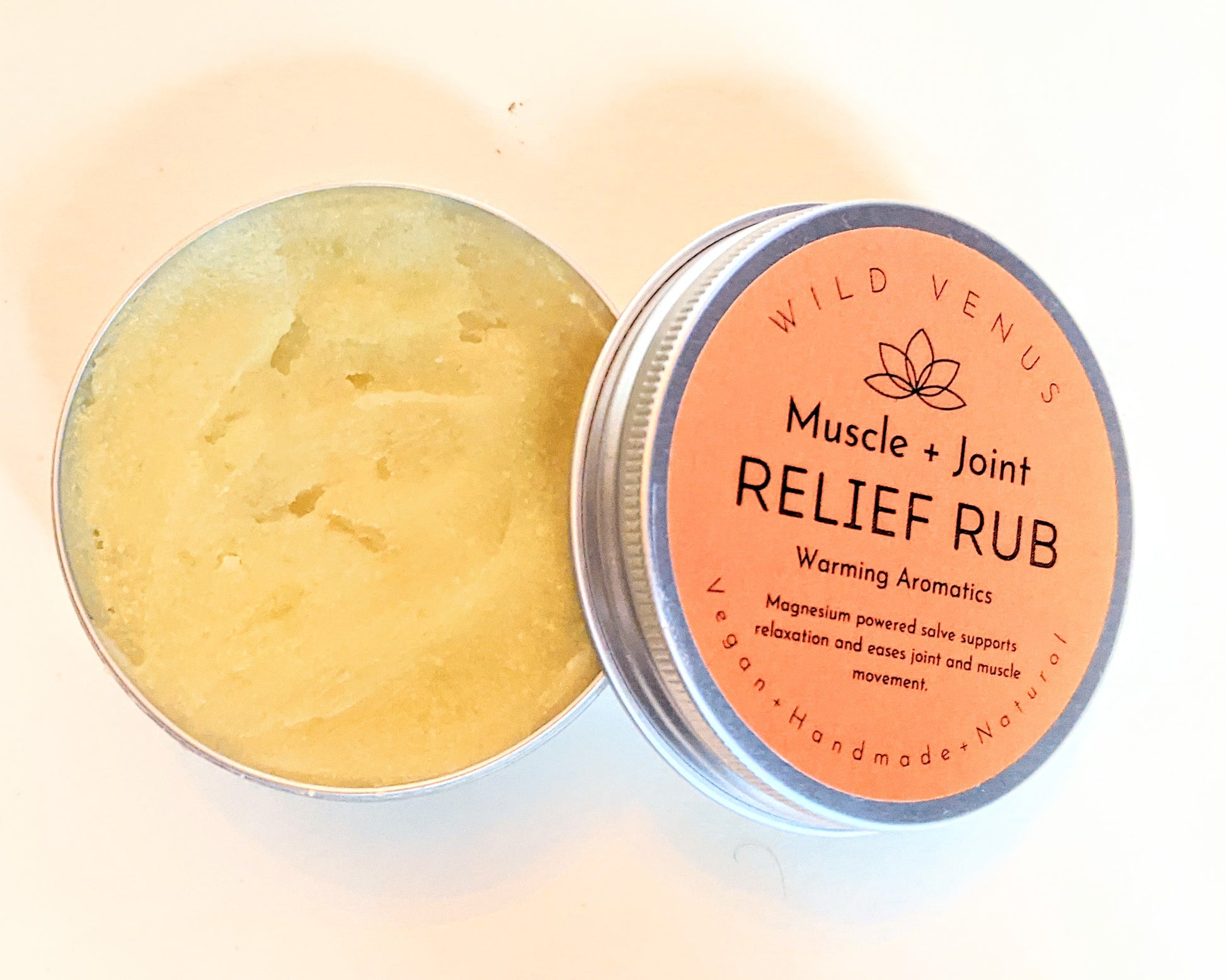 An open tin of the Muscle and Joint Relief Rub