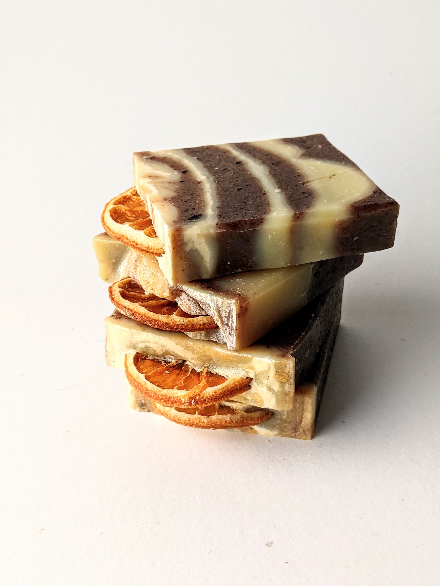 A twisted stack of 4 Winter Spice soaps.