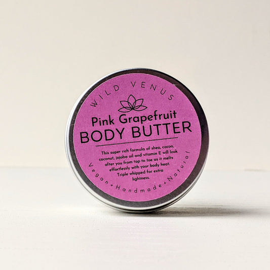 A small tin of Pink Grapefruit Body Butter In new packaging. 