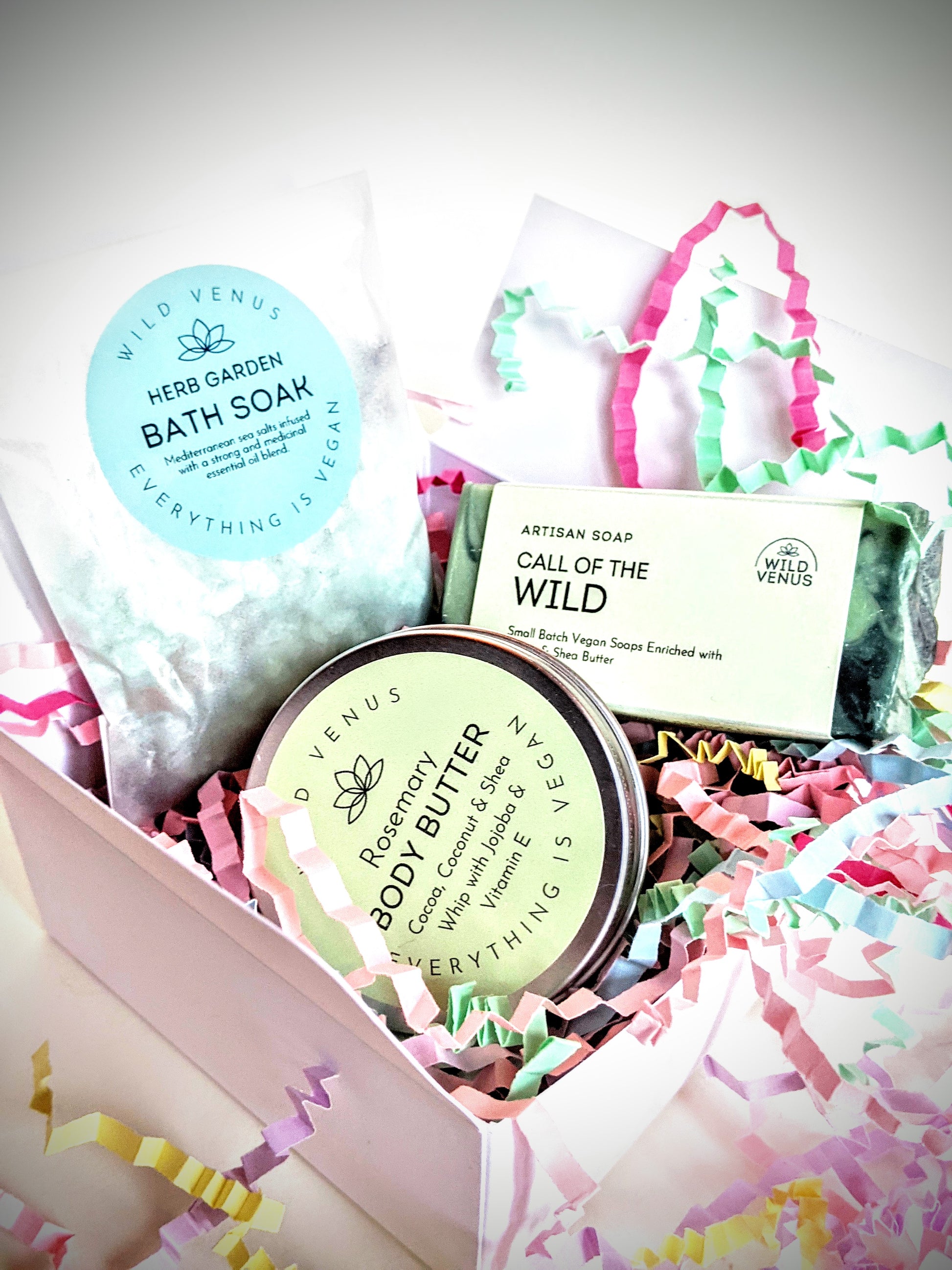An open box of the rosemary fields body butter gift.