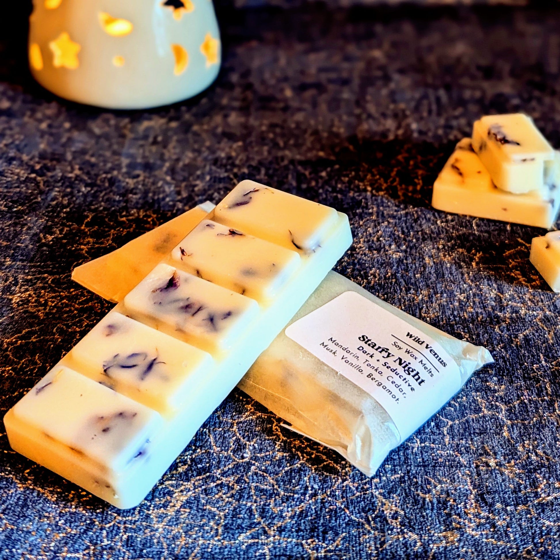 An unwrapped large bar of the starry night soy wax melt. 