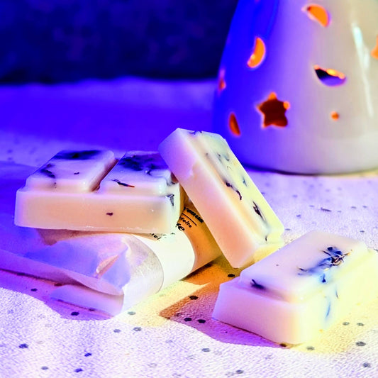 An unwrapped large bar of the starry night soy wax melt. 