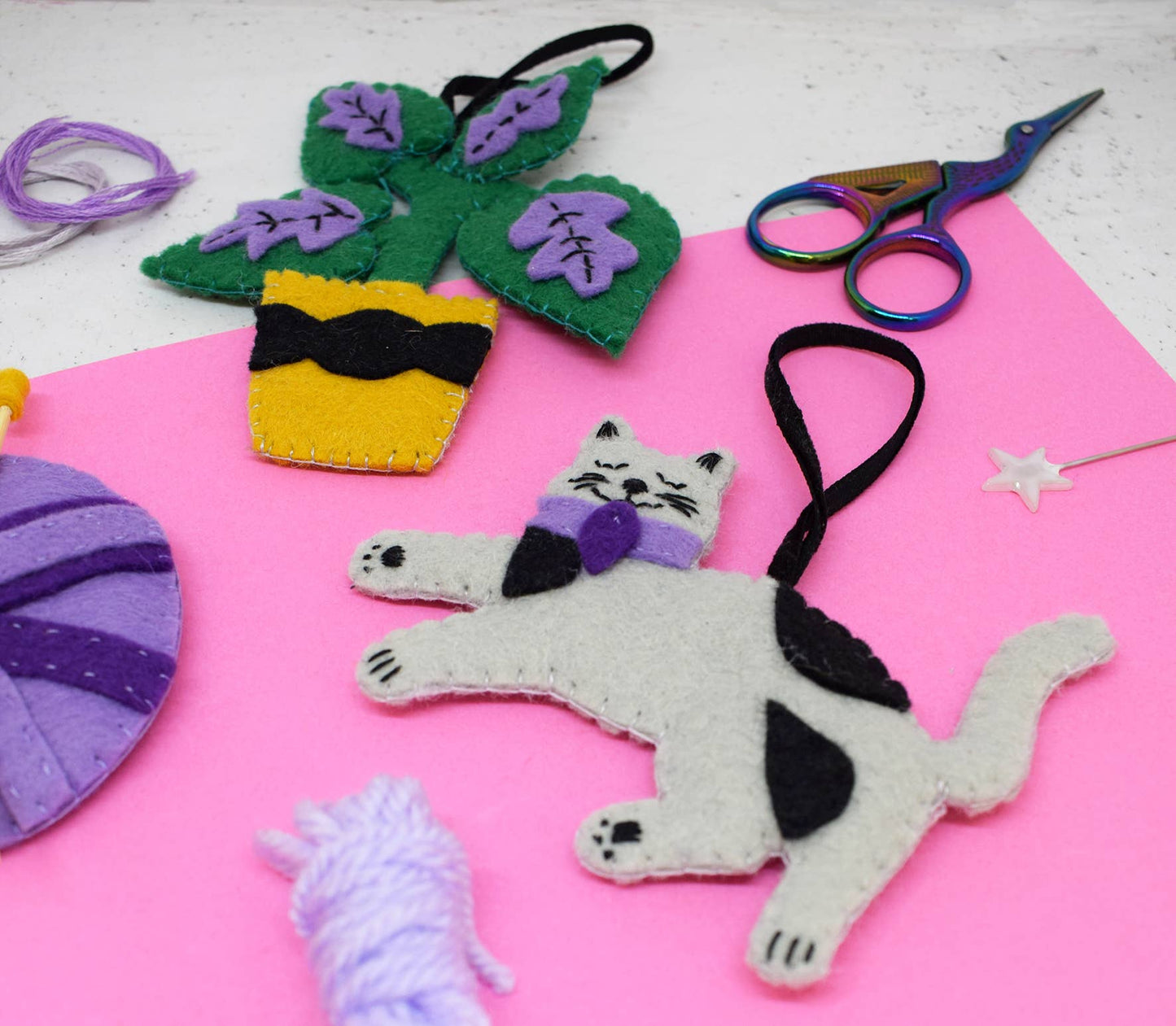 Photo of the crafty cat set which creates a cat, ball of yarn and a plant.