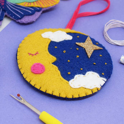 The magical felt stitching kit contains makes a lovely moon hanging decoration.
