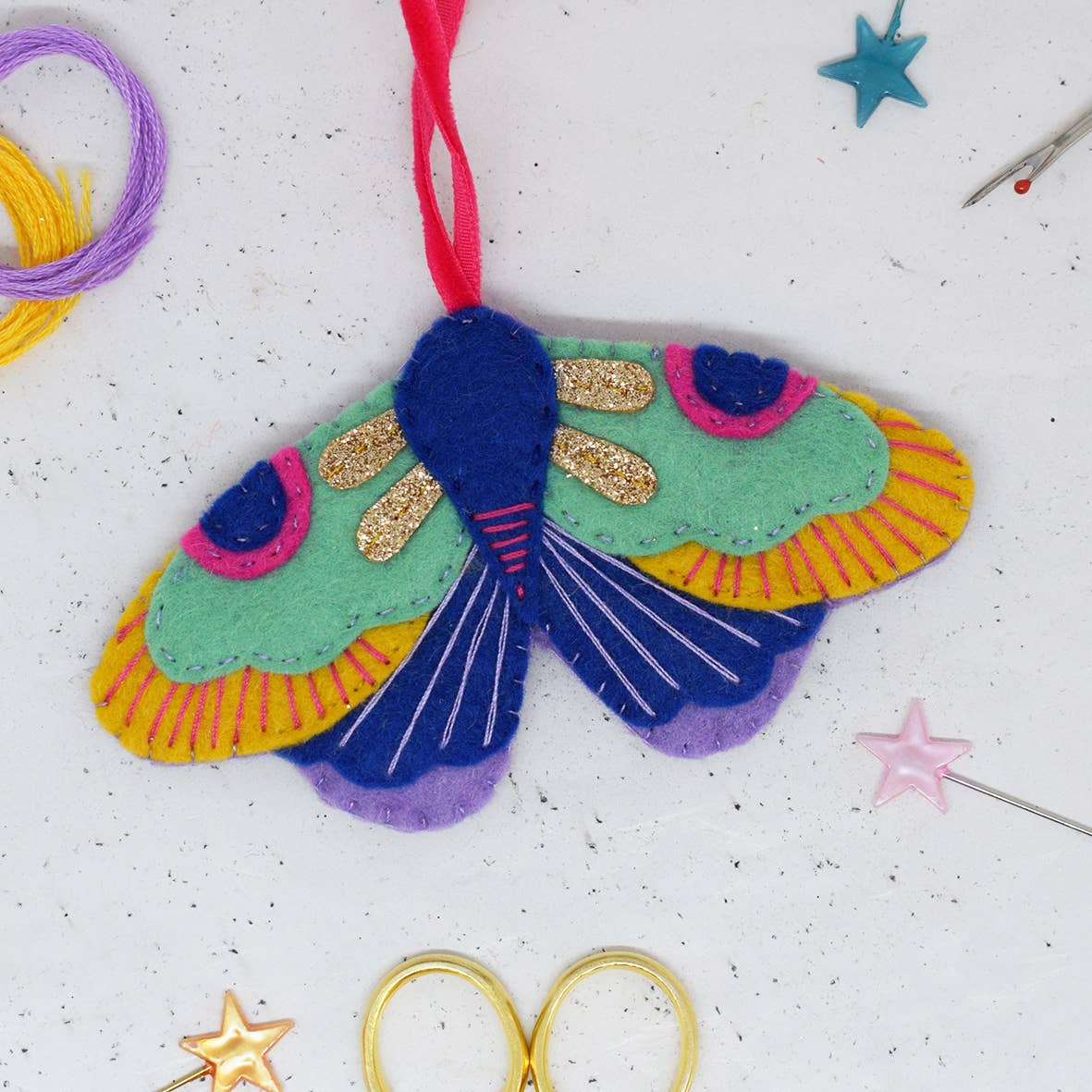 The magical felt stitching kit contains makes a lovely hanging decoration of a moth.