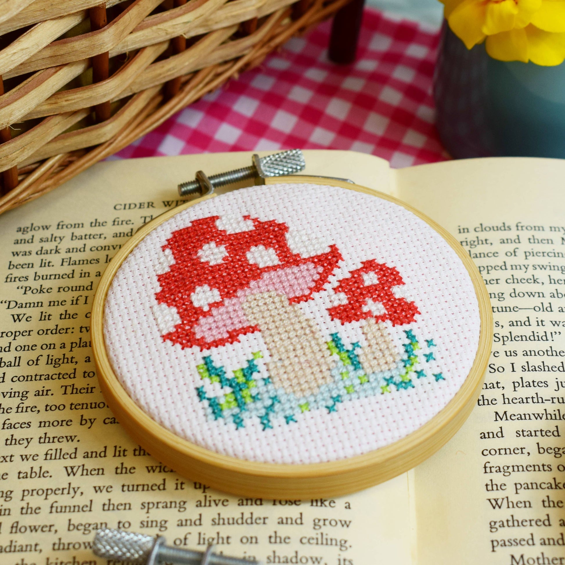 A completed 'Toadstool' mini cross stitch kit.