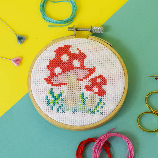 A pretty 'Toadstool' mini cross stitch kit.