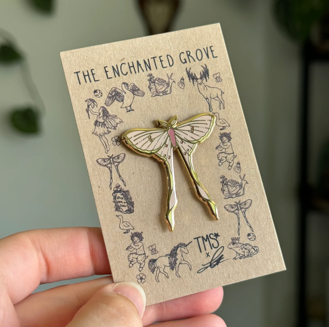 The Mourning star silk moth enamel pin