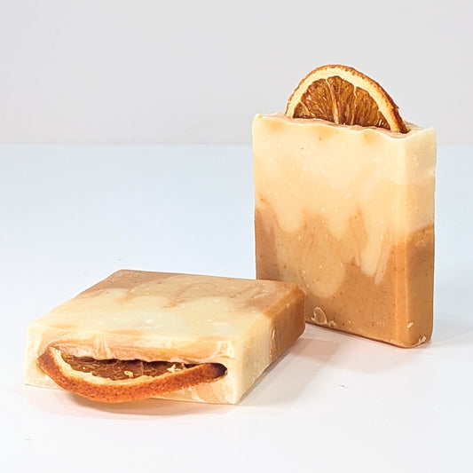 Two bars of turmeric glow vegan soap palm oil free soap.