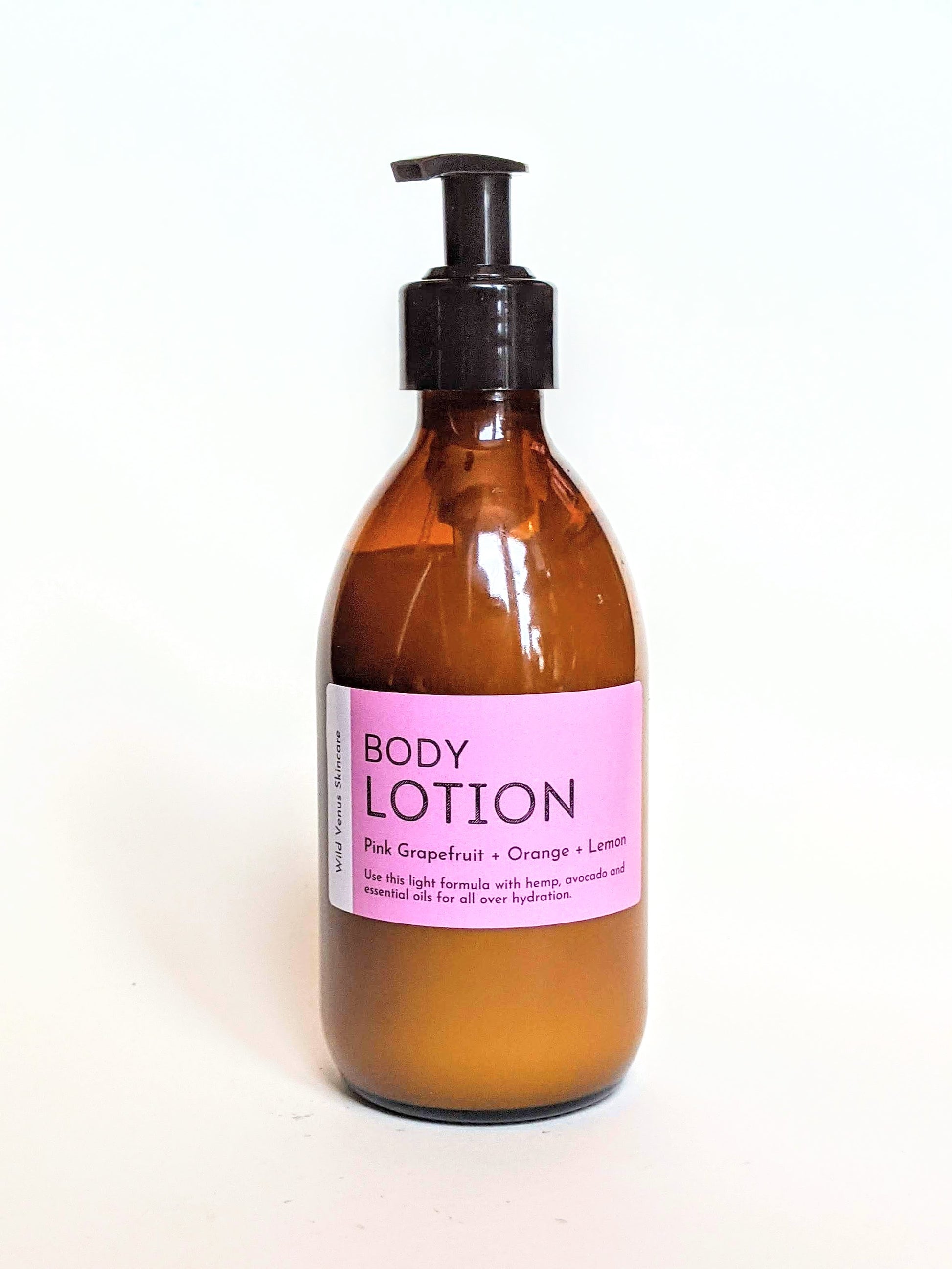 A bottle of the pink grapefruit, orange and lemon hand and body lotion. 