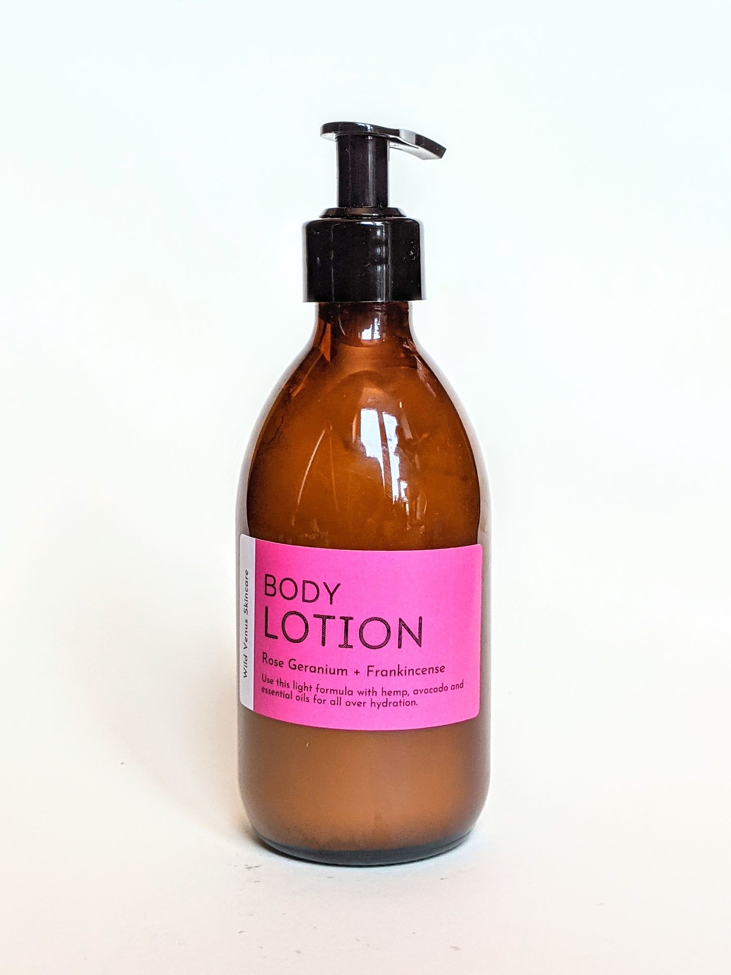 A bottle of rose geranium and frankincense hand and body lotion